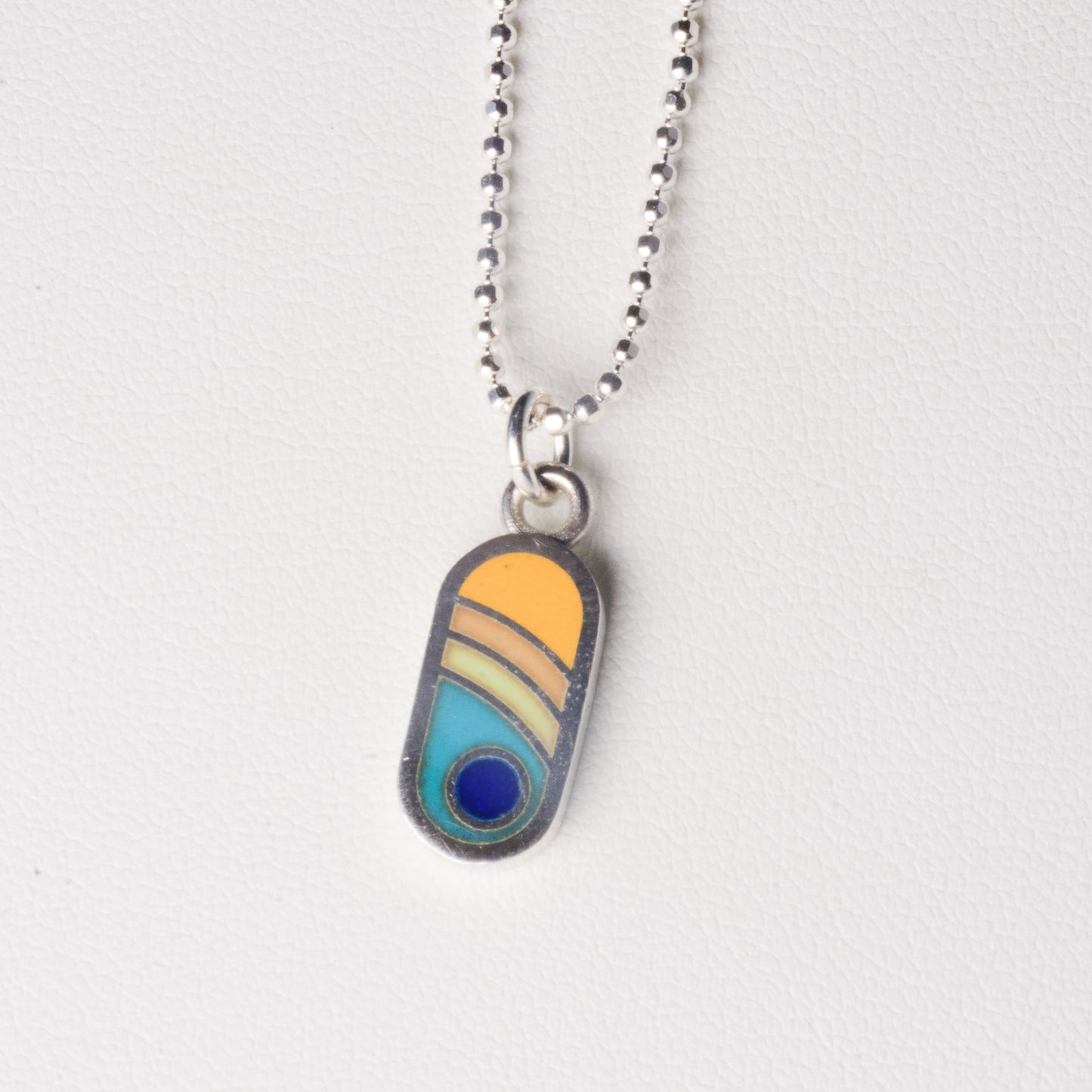 Echo Metals Sunny Charm Necklace featuring a bright, sun-shaped charm on a delicate chain, perfect for casual or layered styles.