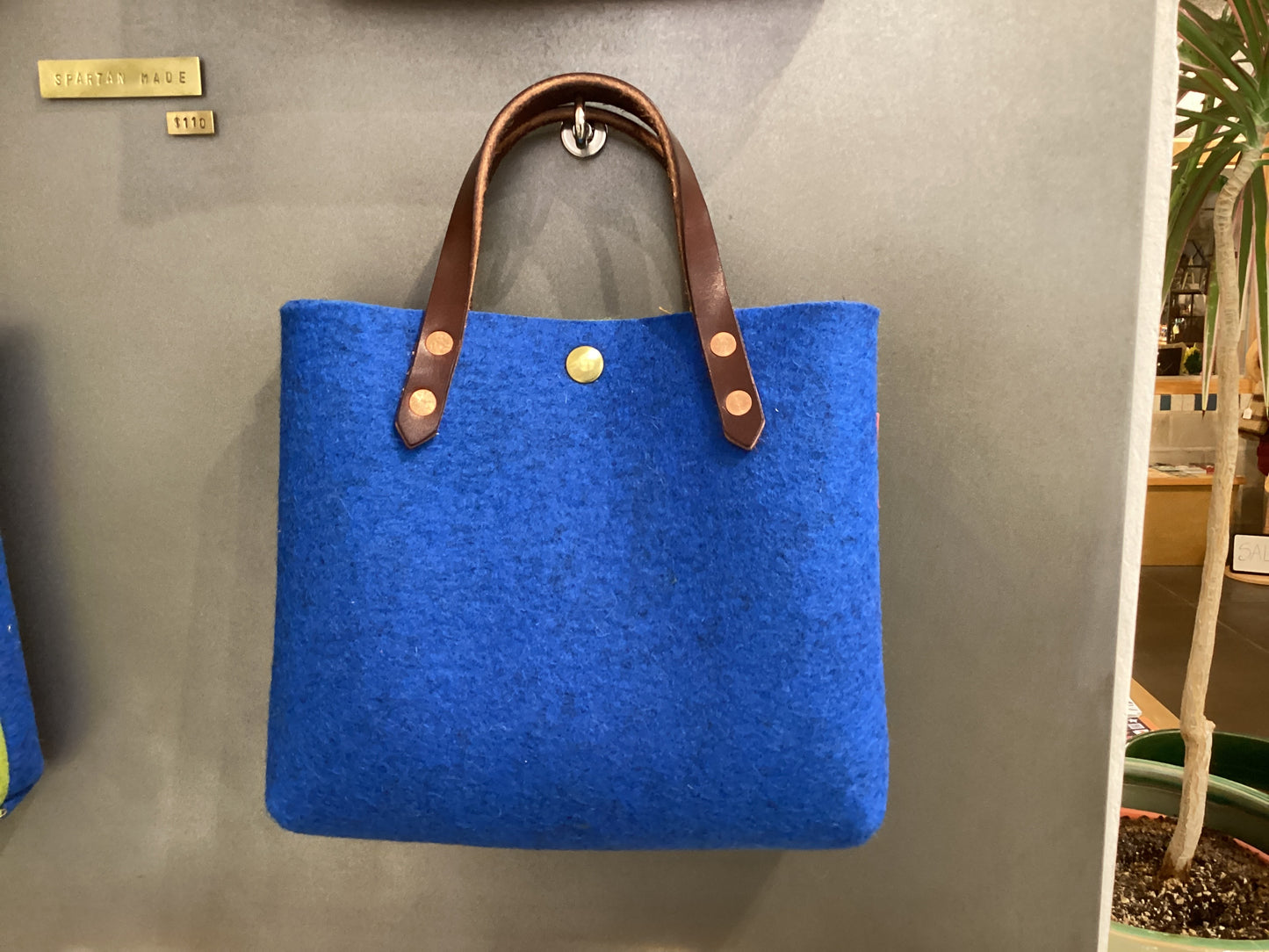 Two-toned felt mini tote bag by Spartan Made featuring a stylish, compact design with sturdy handles.