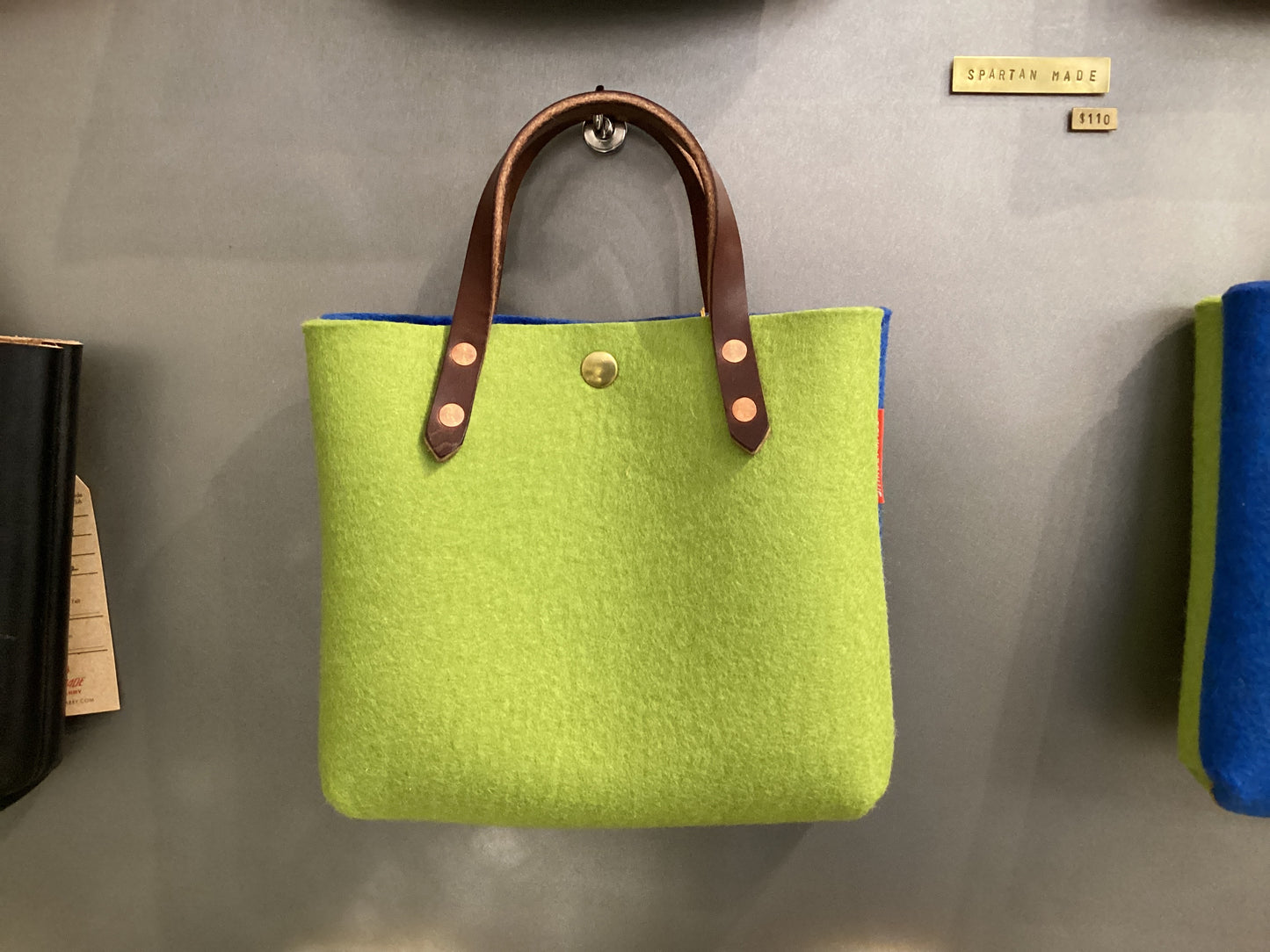 Two-toned felt mini tote bag by Spartan Made, featuring a stylish compact design and sturdy handles for everyday use.