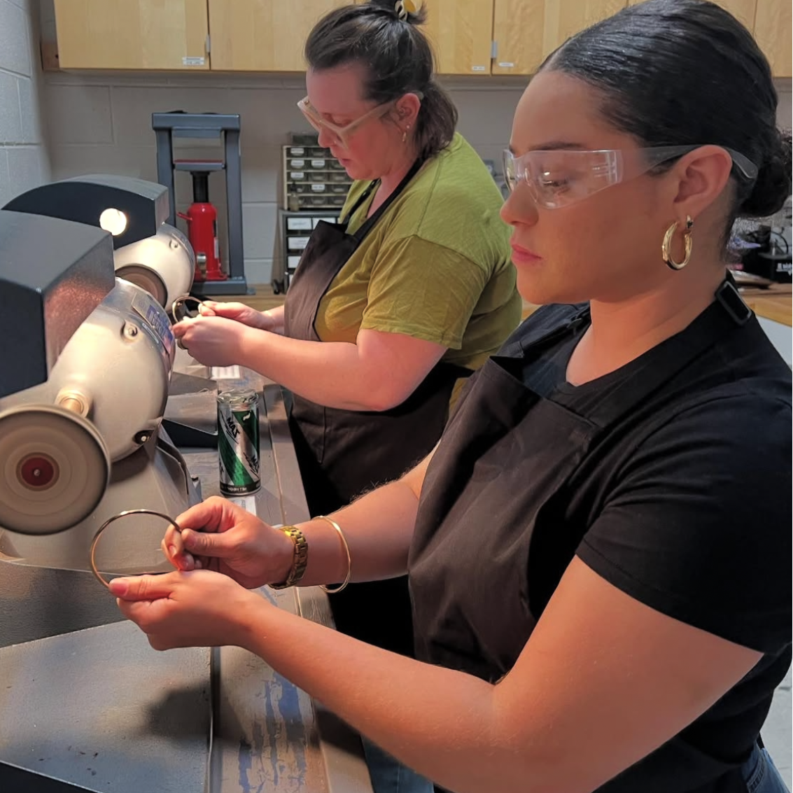 Intro to Jewelry class by Alloy Atelier showing a collection of jewelry tools and sample pieces on a white background.