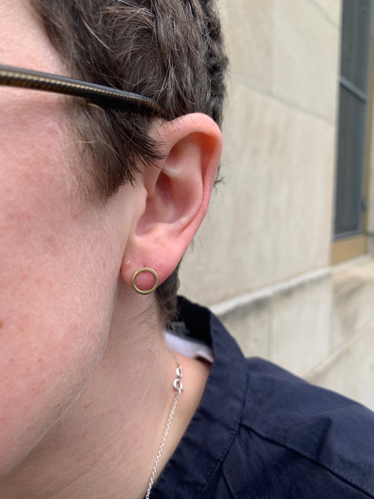 Ellyse Bendillo brass circle stud earrings featuring minimalist round design for a stylish, modern look.