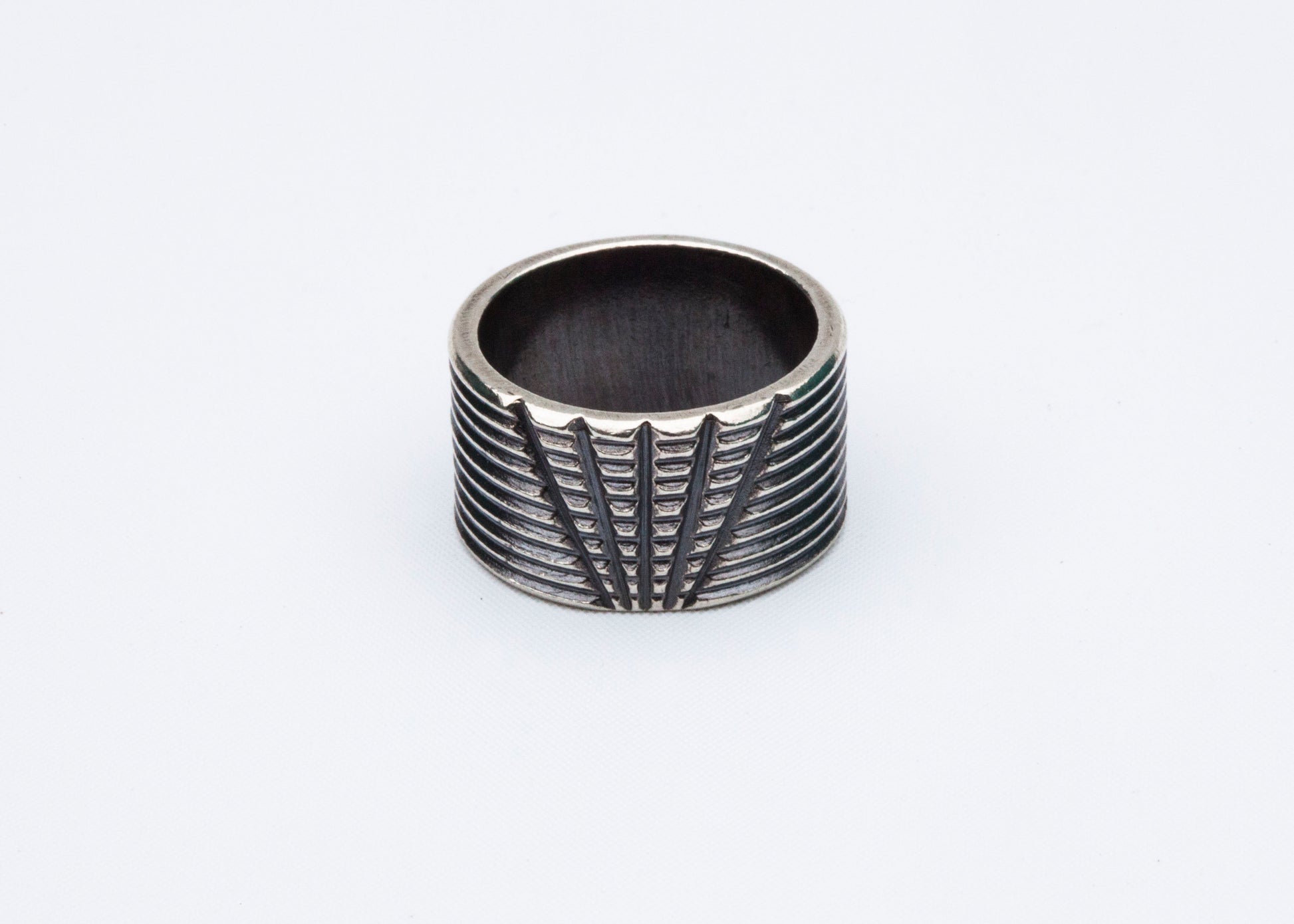 Echo Metals cut crystal band ring with faceted crystal design and sleek silver finish, showcasing elegant craftsmanship.