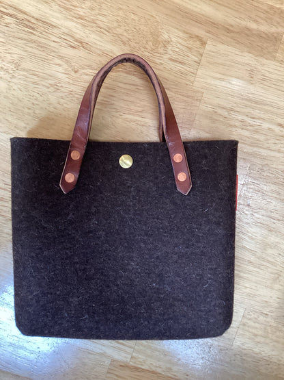 Felt mini tote bag by Spartan Made featuring a compact design and sturdy handles, perfect for everyday use.