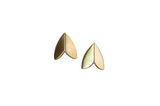 Brushed brass moth wing stud earrings by Ellyse Bendillo, featuring detailed wing-shaped designs in a natural, polished finish.