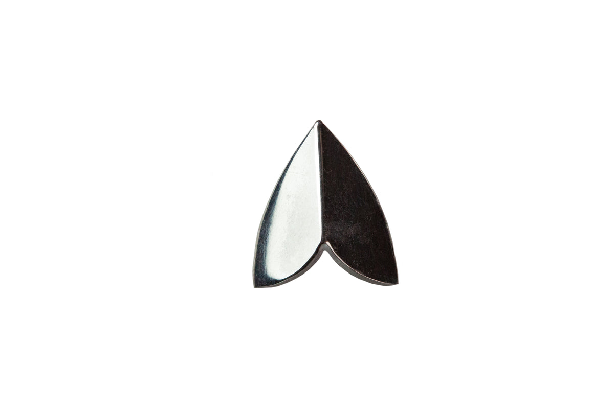 Close-up of polished silver moth wing stud earrings by Ellyse Bendillo, showcasing intricate wing details and shiny finish.