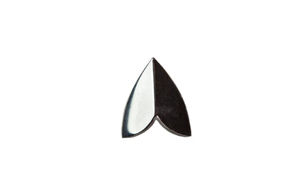 Close-up of polished silver moth wing stud earrings by Ellyse Bendillo, showcasing intricate wing details and shiny finish.