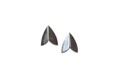 Ellyse Bendillo polished silver moth wing stud earrings displayed together on a white background.