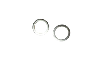Silver Ellyse Bendillo circle studs, small round earrings with a minimalist design, displayed together on a white background.