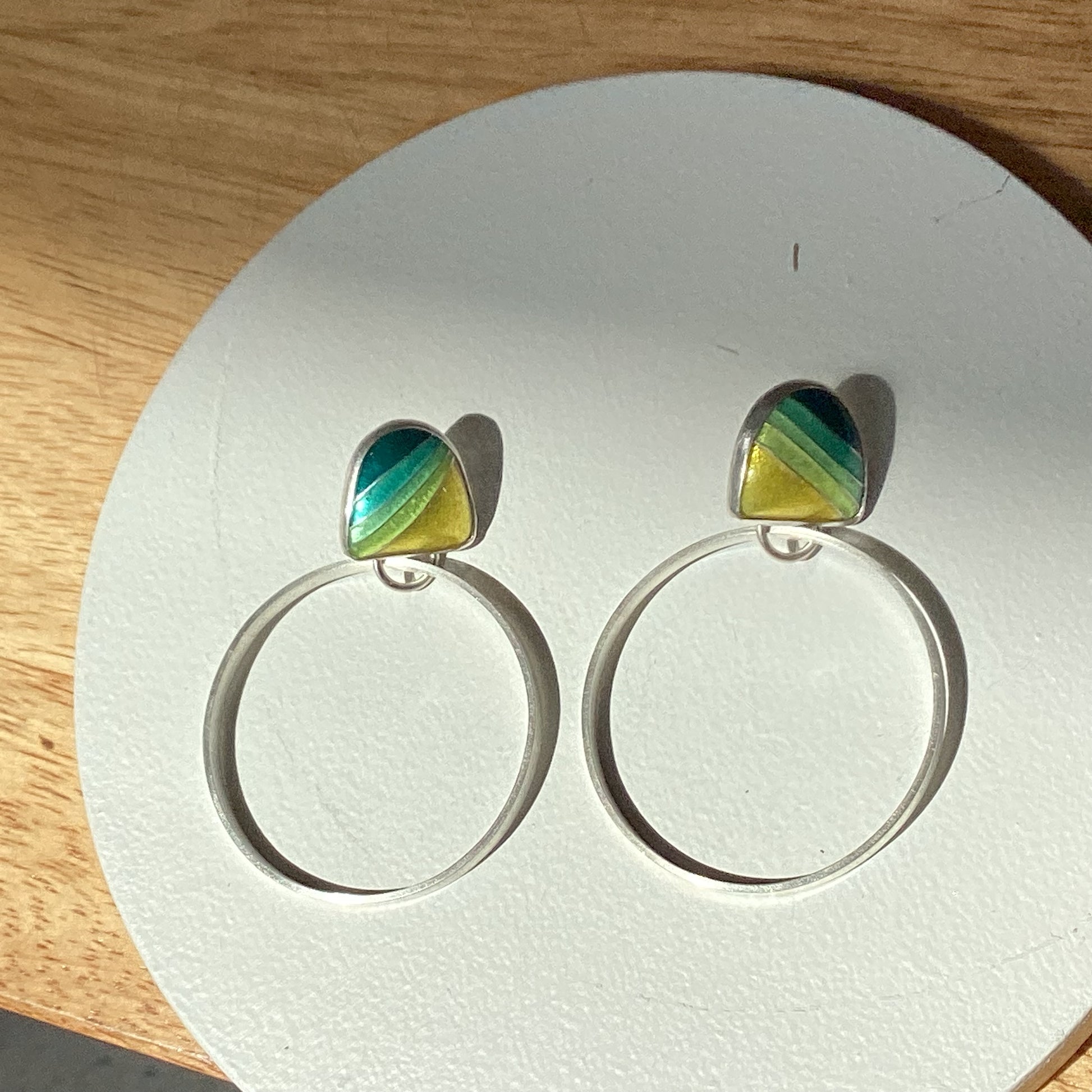 Echo Metals Loopy Hoops earrings featuring large, circular hoop design with a shiny metallic finish.