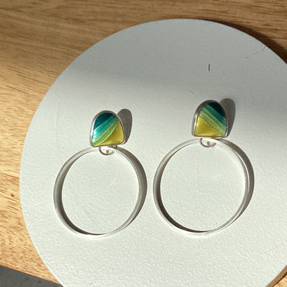 Echo Metals Loopy Hoops earrings featuring large, circular hoop design with a shiny metallic finish.