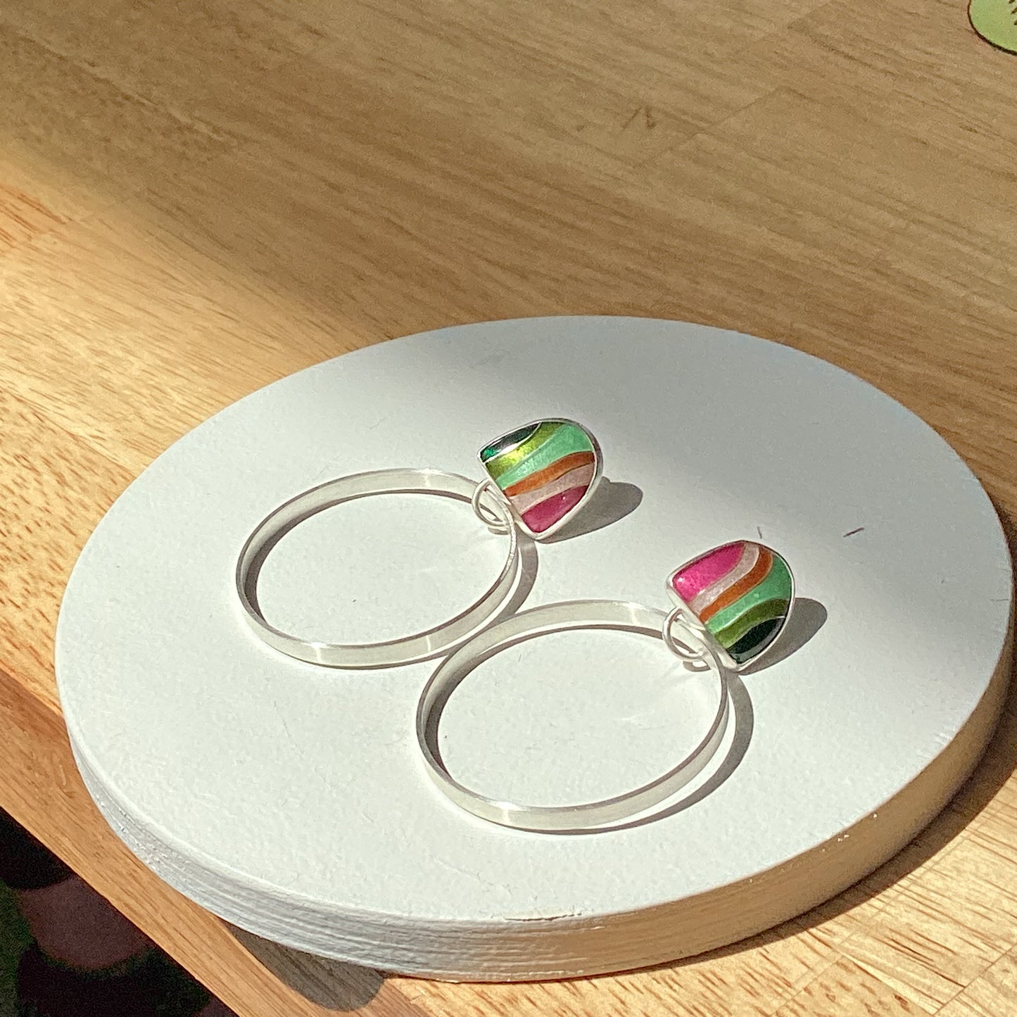 Echo Metals Loopy Hoops earrings featuring intertwined circular hoops with a polished finish.