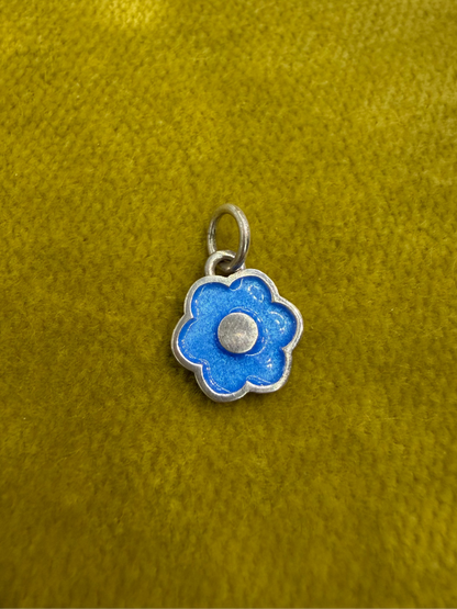 Large flower charm by Ellyse Bendillo, close-up of intricate design and vibrant petal details on a charm-only accessory.