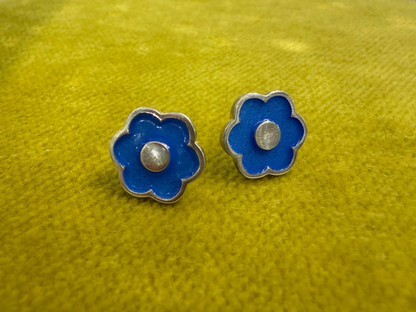 Ellyse Bendillo large flower stud earrings featuring detailed petal designs and silver-tone finish, close-up view.