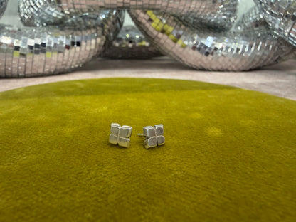 Ellyse Bendillo wedge stud earrings featuring sleek, modern studs with wedge design, perfect for stylish everyday wear.