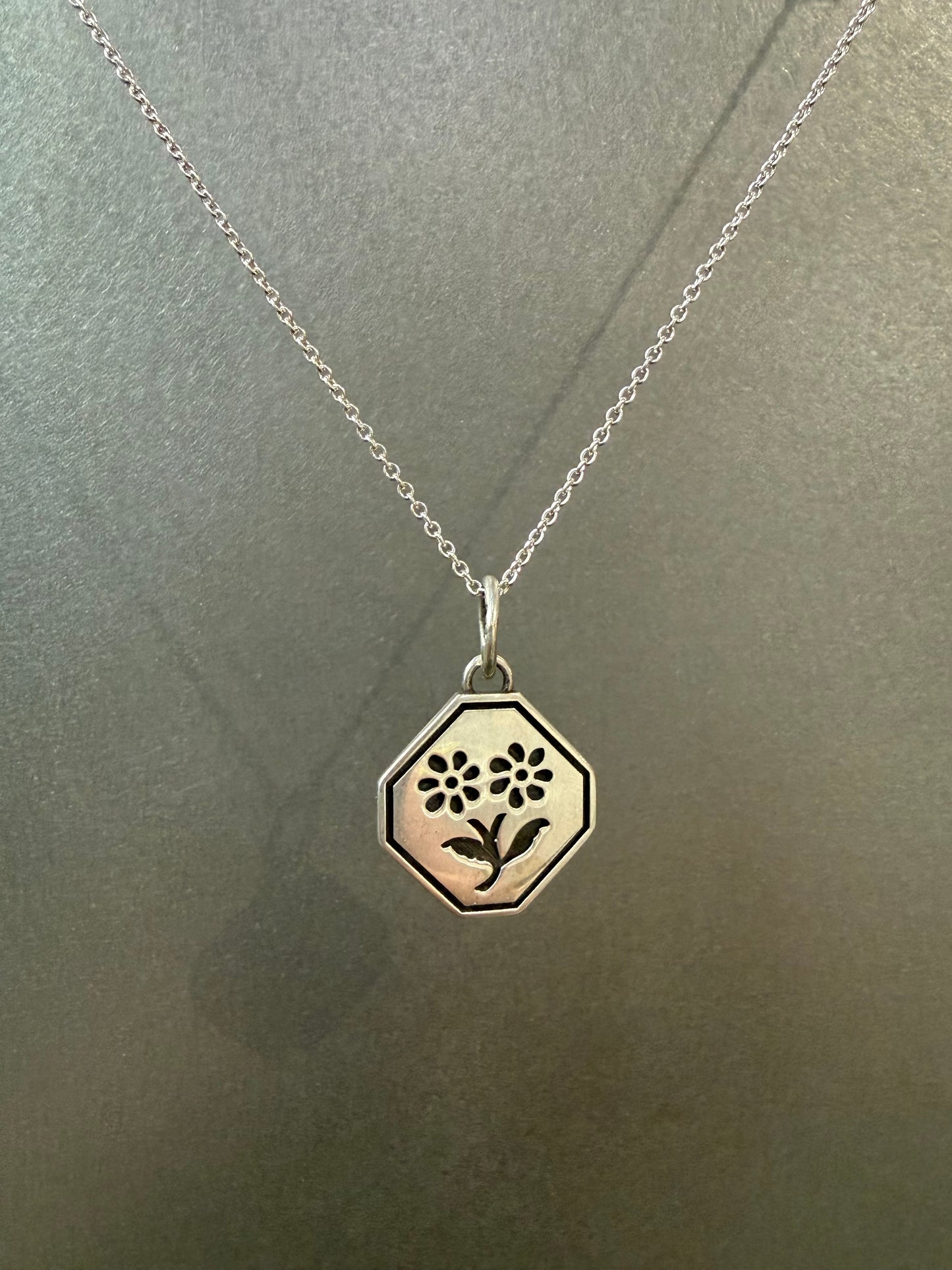 Ellyse Bendillo Floral Duet Charm featuring delicate flower design on a small, elegant charm for jewelry.