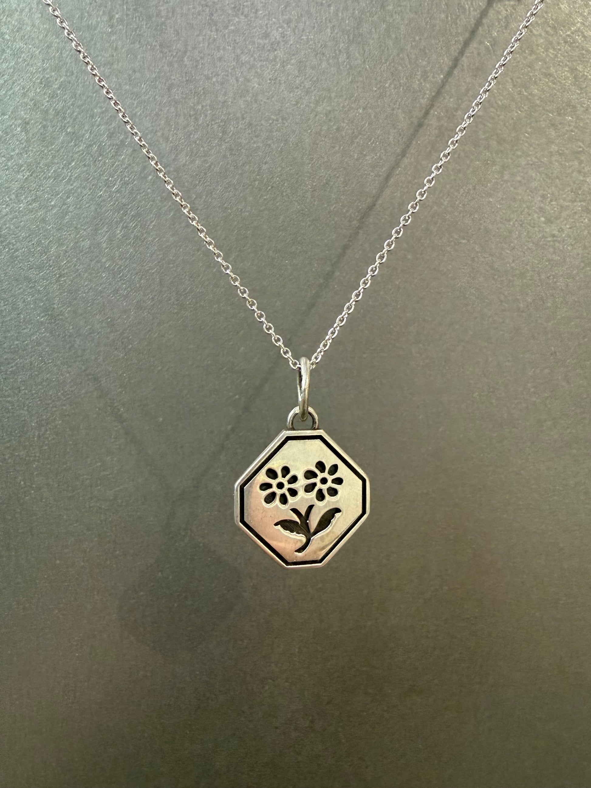 Ellyse Bendillo Floral Duet Charm featuring delicate flower design on a small, elegant charm for jewelry.