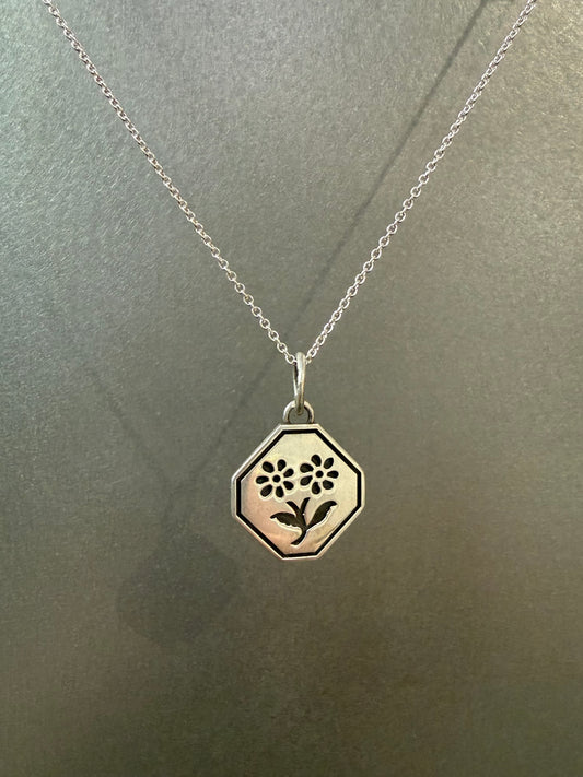 Ellyse Bendillo Floral Duet Charm featuring delicate flower design on a small, elegant charm for jewelry.