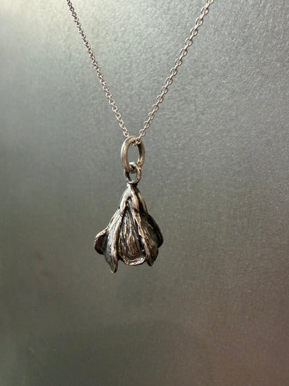 Ellyse Bendillo Magnolia Charm featuring detailed floral design, perfect as a delicate jewelry accessory or charm.