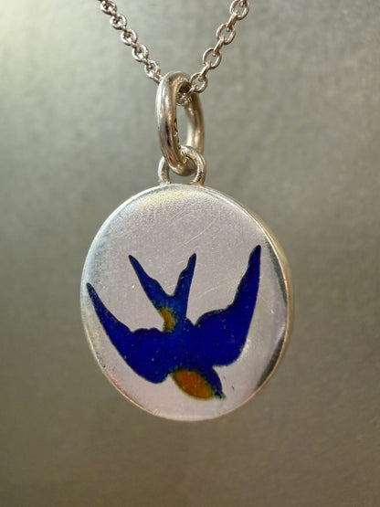 Ellyse Bendillo swallow charm featuring a detailed silver bird pendant on a delicate chain.