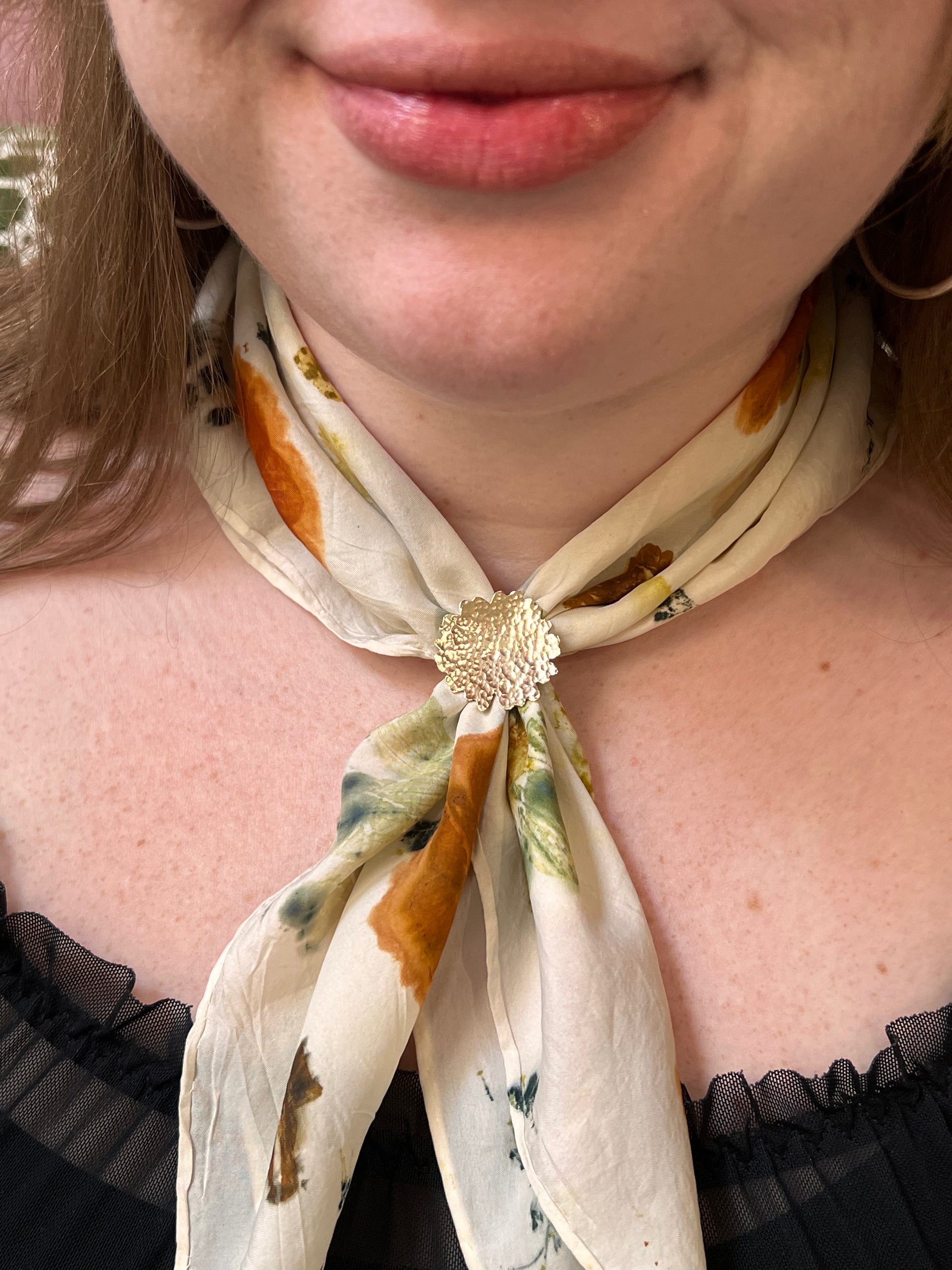 Eco printing and woggle workshop with Alloy Atelier, featuring natural plant-dyed paper and handmade woven woggles on a wooden table.