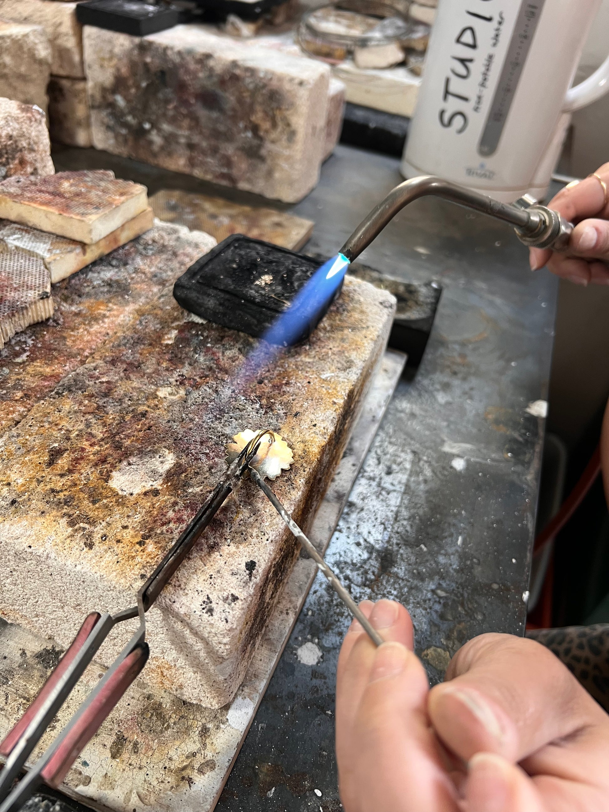 Eco printing and woggle workshop with Alloy Atelier, showing participants creating nature-inspired prints and woven woggles.