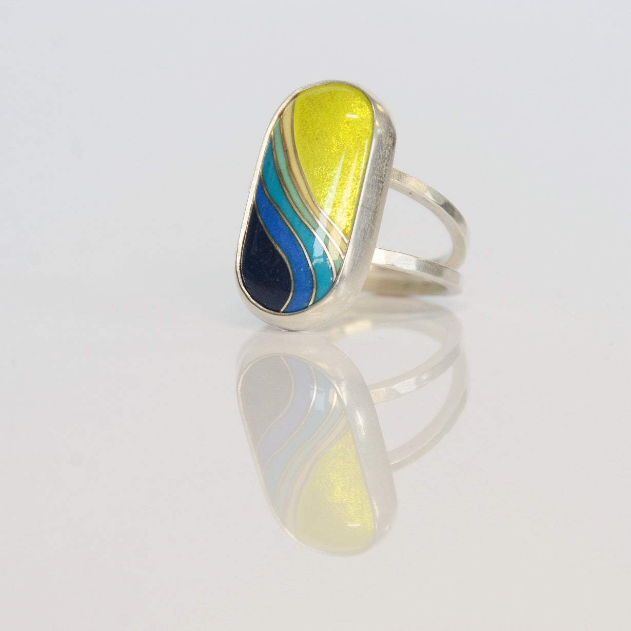 Enamel Neon Wavelet Ring by Echo Metals, featuring a vibrant, colorful wave design on a sleek enamel ring.