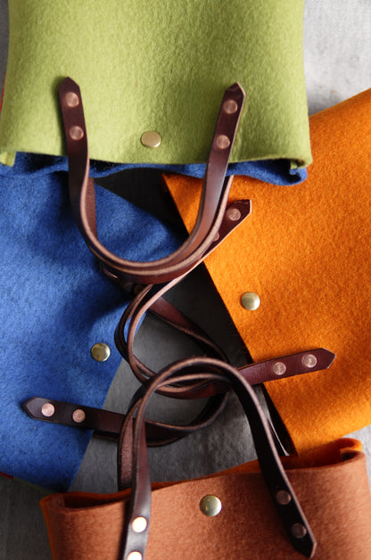 Two-toned felt mini tote bag by Spartan Made, showcasing a compact and stylish design with sturdy handles.