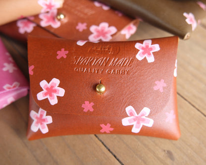Spartan Made leather wallet with a medium-sized design, featuring a painted front and multiple card slots.