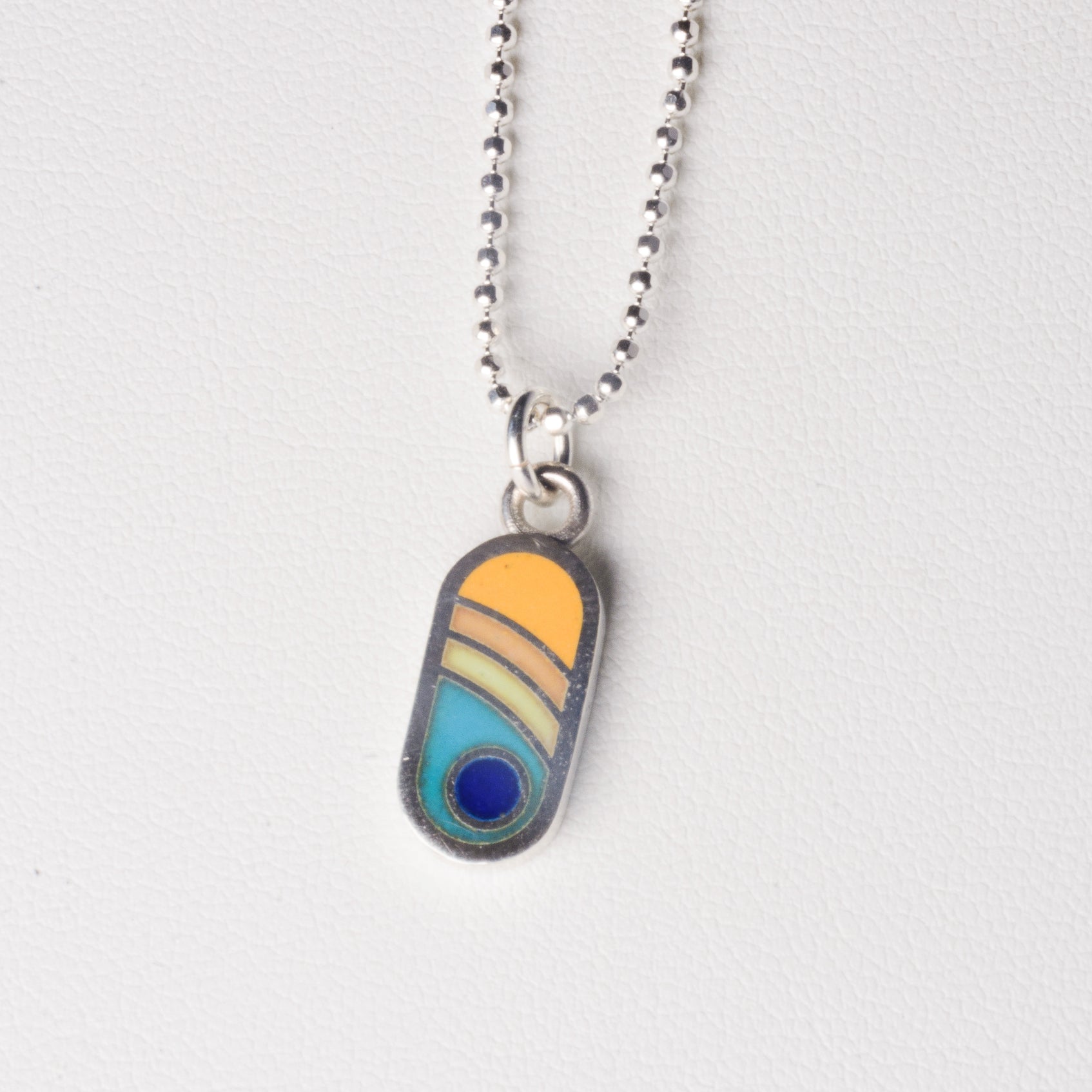 Echo Metals Sunny Charm Necklace featuring a bright, sun-shaped charm on a delicate chain, perfect for casual or layered styles.