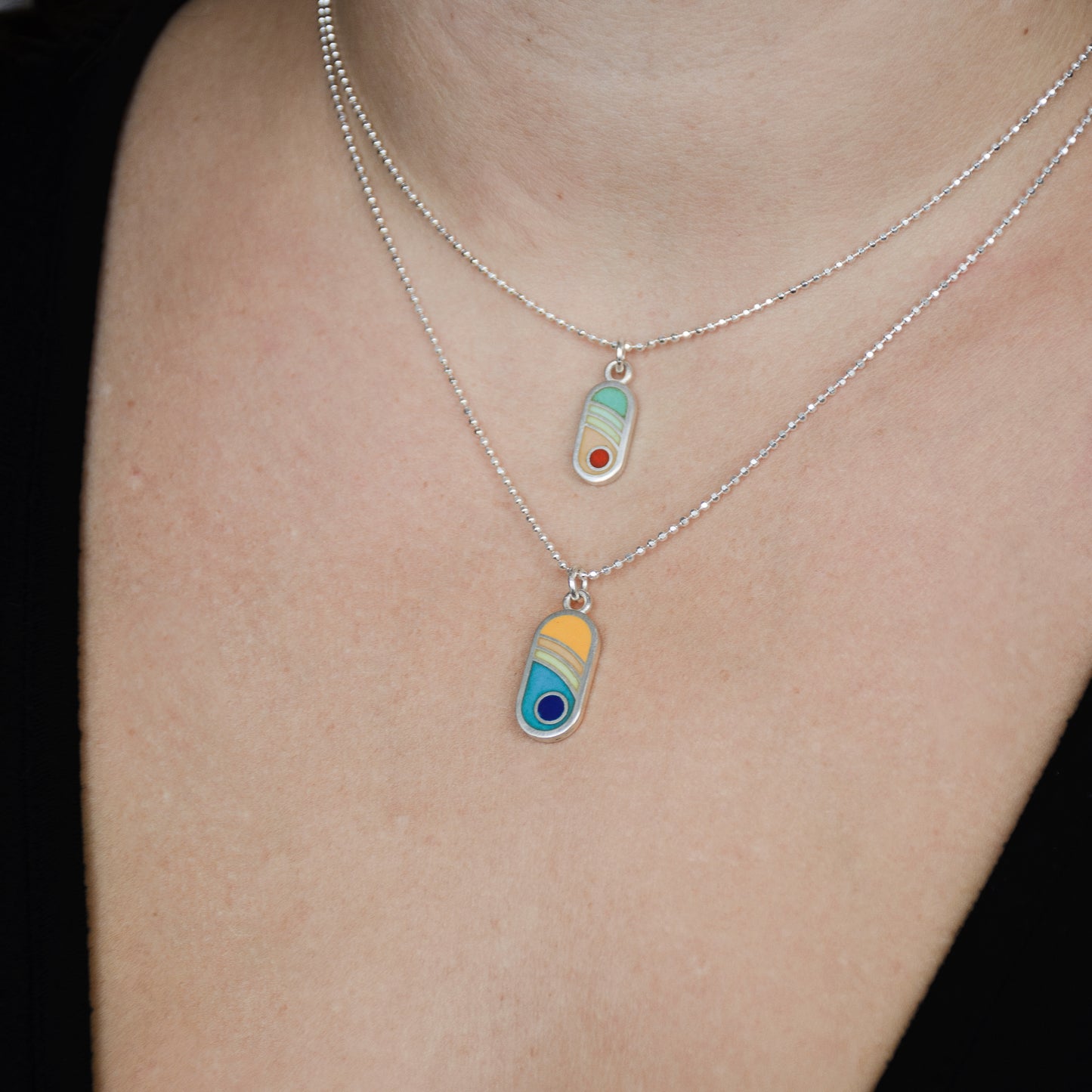 Echo Metals Sunny Charm necklace featuring a cheerful sun pendant on a sleek chain, perfect for casual or layered jewelry styles.