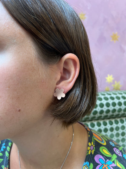 Alloy Atelier five-petal stud earrings with a delicate floral design, displayed from the front view.
