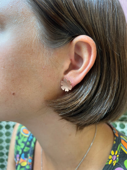 Side view of Alloy Atelier Post Earrings Workshop with six-petal stud earrings featuring a delicate floral design.