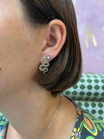 Silver snake-shaped post earrings by Alloy Atelier, featuring a sleek and modern design with detailed craftsmanship.